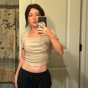 - cropped shirt
- cream and cinched at breast area
- perfect for any occasions